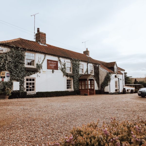 An exterior of the King Henry th IV Pub and Hotel in Sedgeford, Norfolk, England, recommended as a safe place for women to stay by JourneyWoman readers.