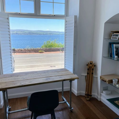 A view of the sea from the living area of Wild at Art Scotland artist retreat.