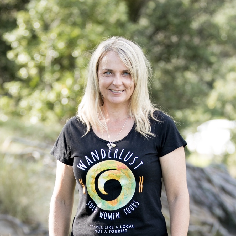 Head shot of Gina Cambridge, founder of Wanderlust Travel Coaching