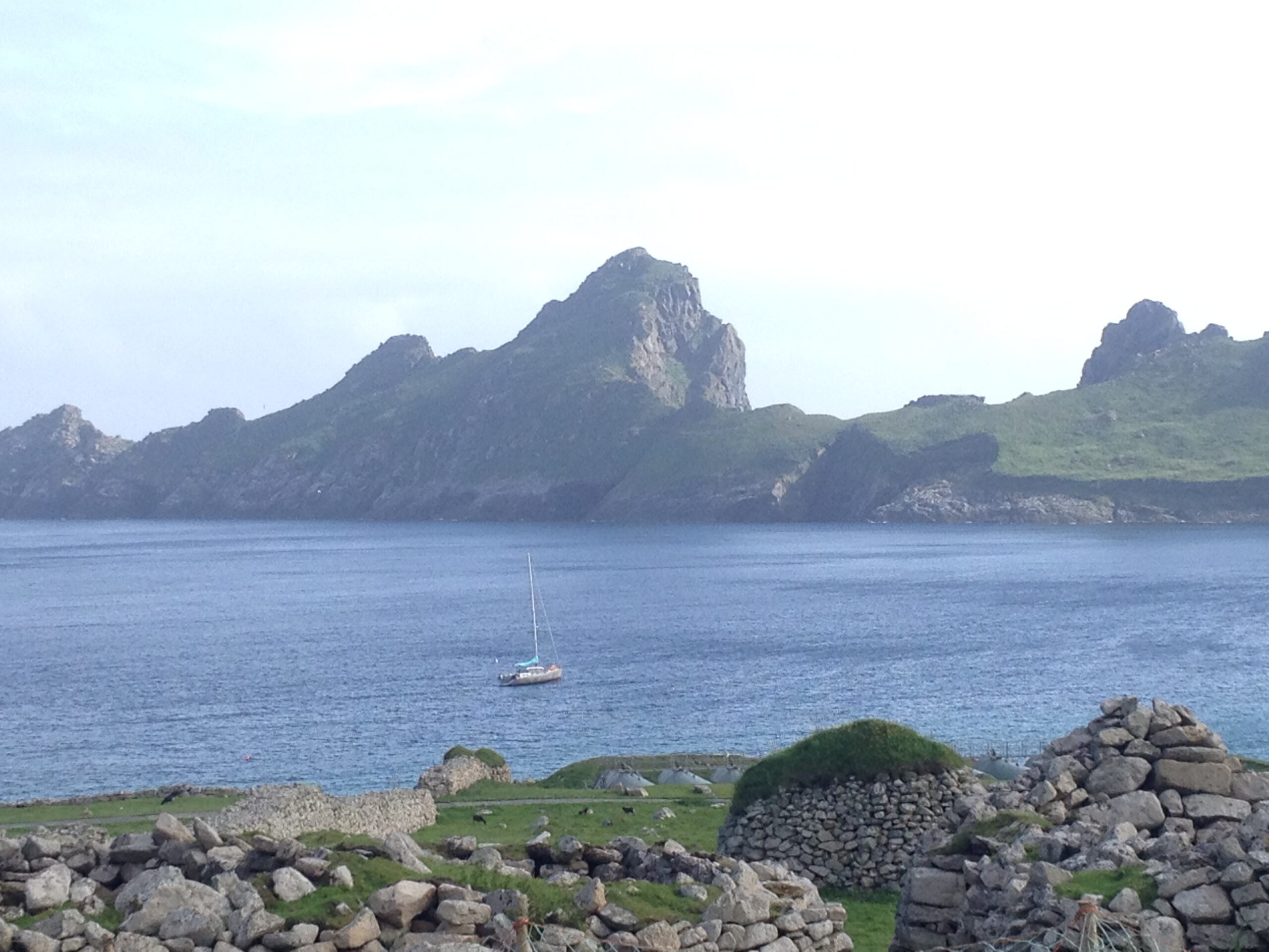 Scenic view of St Kilda's waters, featuring rugged cliffs and open sea, part of the route we'll navigate during the tour Outer Hebrides Explorer.