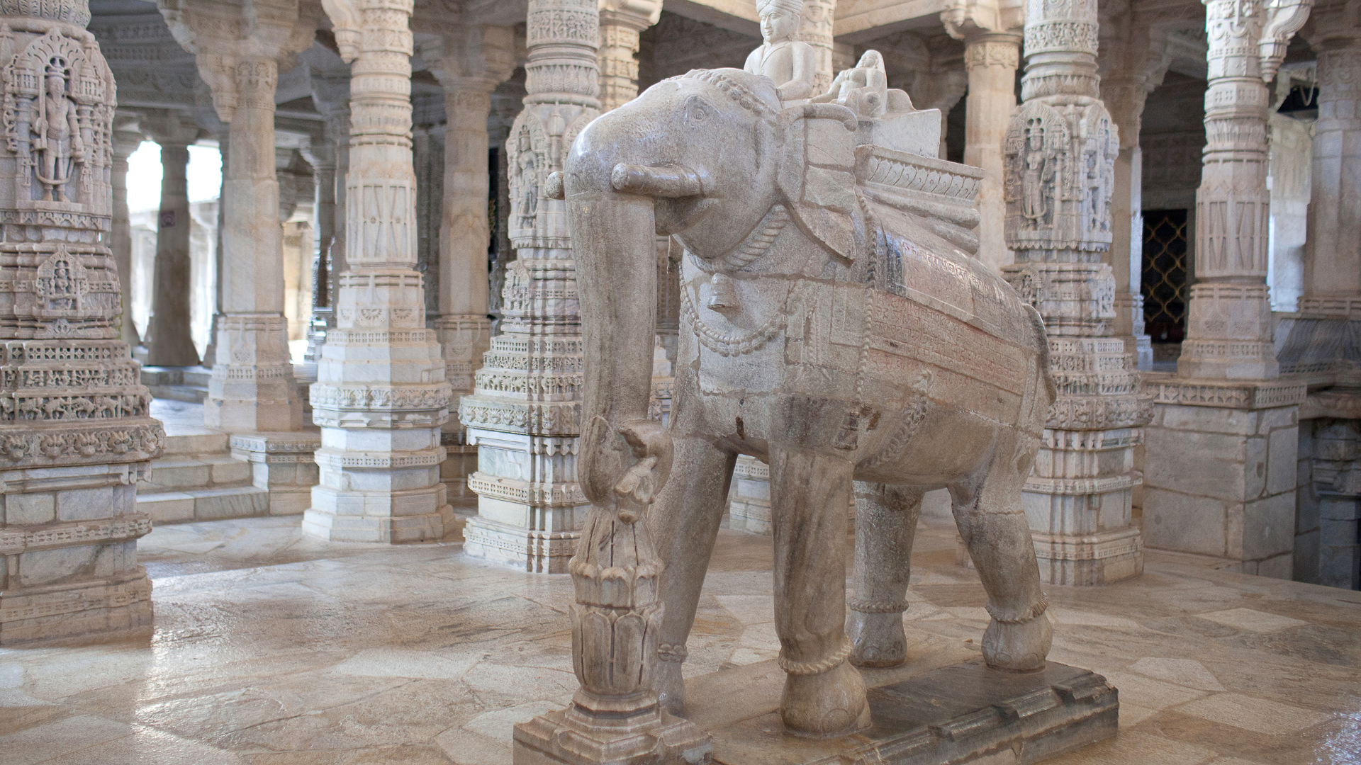 A beautifully carved statue at the Ranakpur Jain Temple a stop of our tour India’s Gujarat & Rajasthan