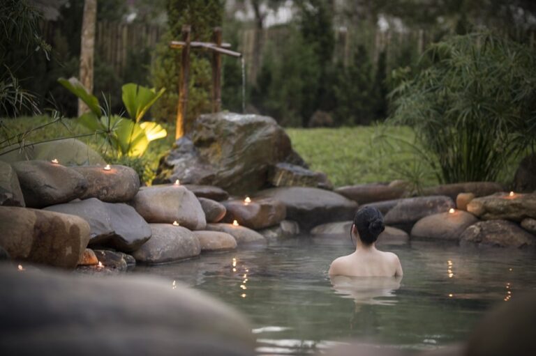 Tranquil hot spring nestled within a spa setting.