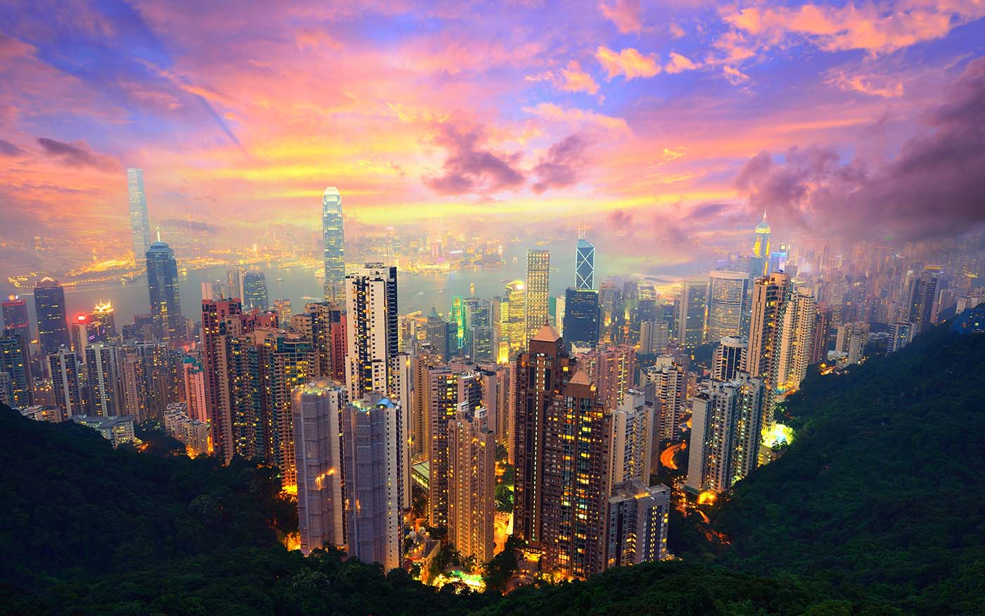 Panoramic aerila view of the iconic skyscrapers dominating the skyline of Hong Kong, showcasing the vibrant urban landscape - Hong Kong & Bali: A Luxury Odyssey from Skylines to Shorelines - Sisterhood Travels