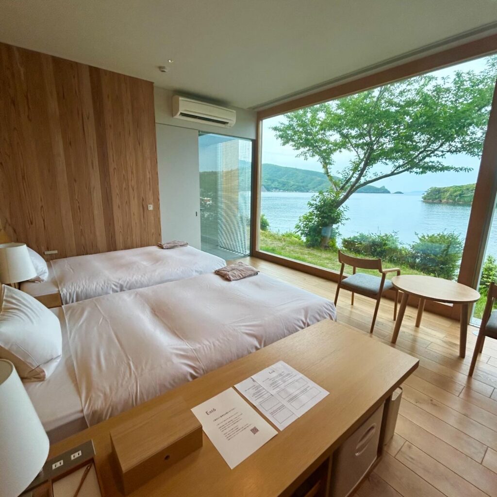 An interior view of a room with a view at the Ento Hotel in Oki Islands, Japan, recommended as a safe place for women to stay.